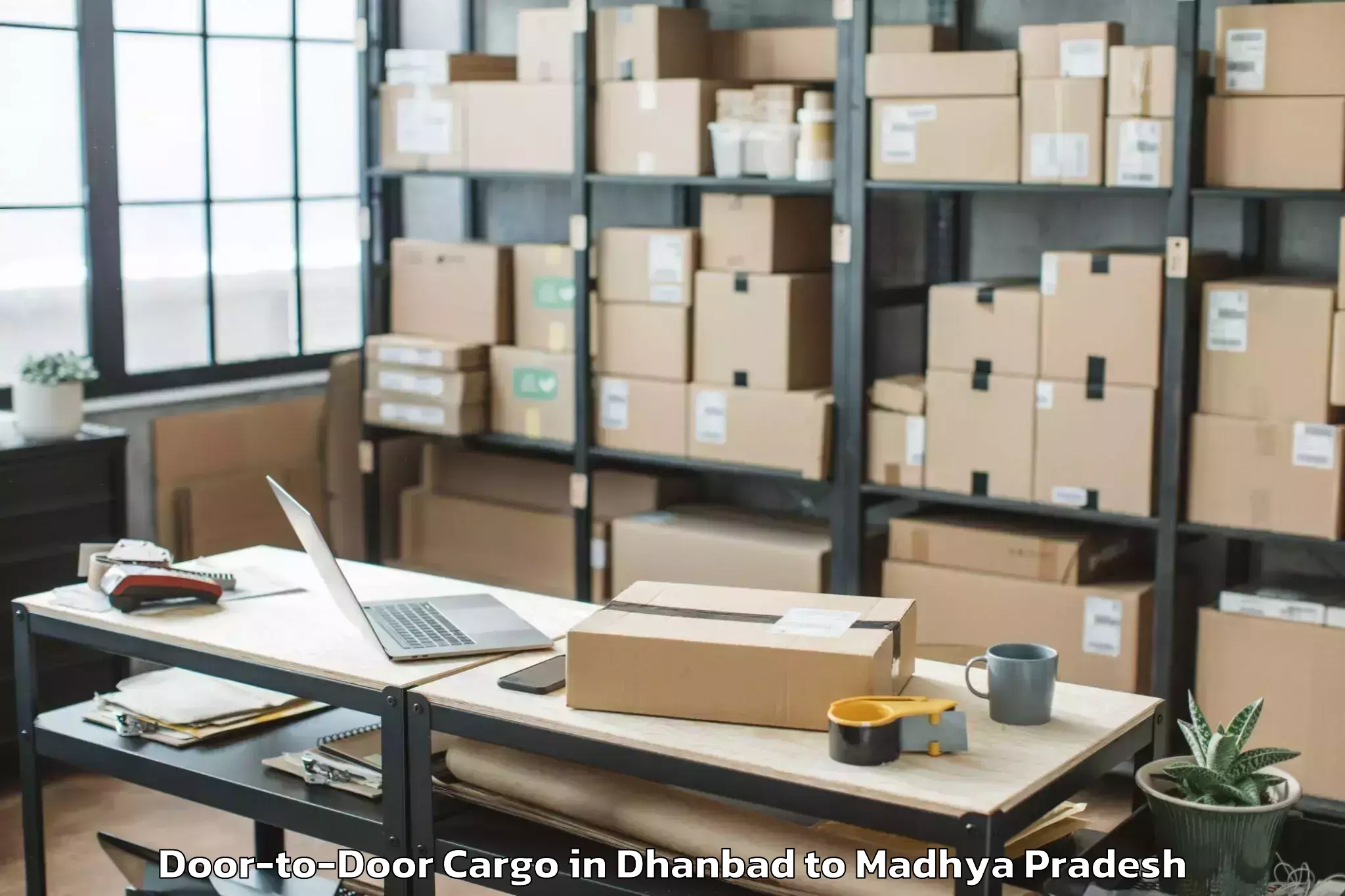 Book Dhanbad to Chanderi Door To Door Cargo